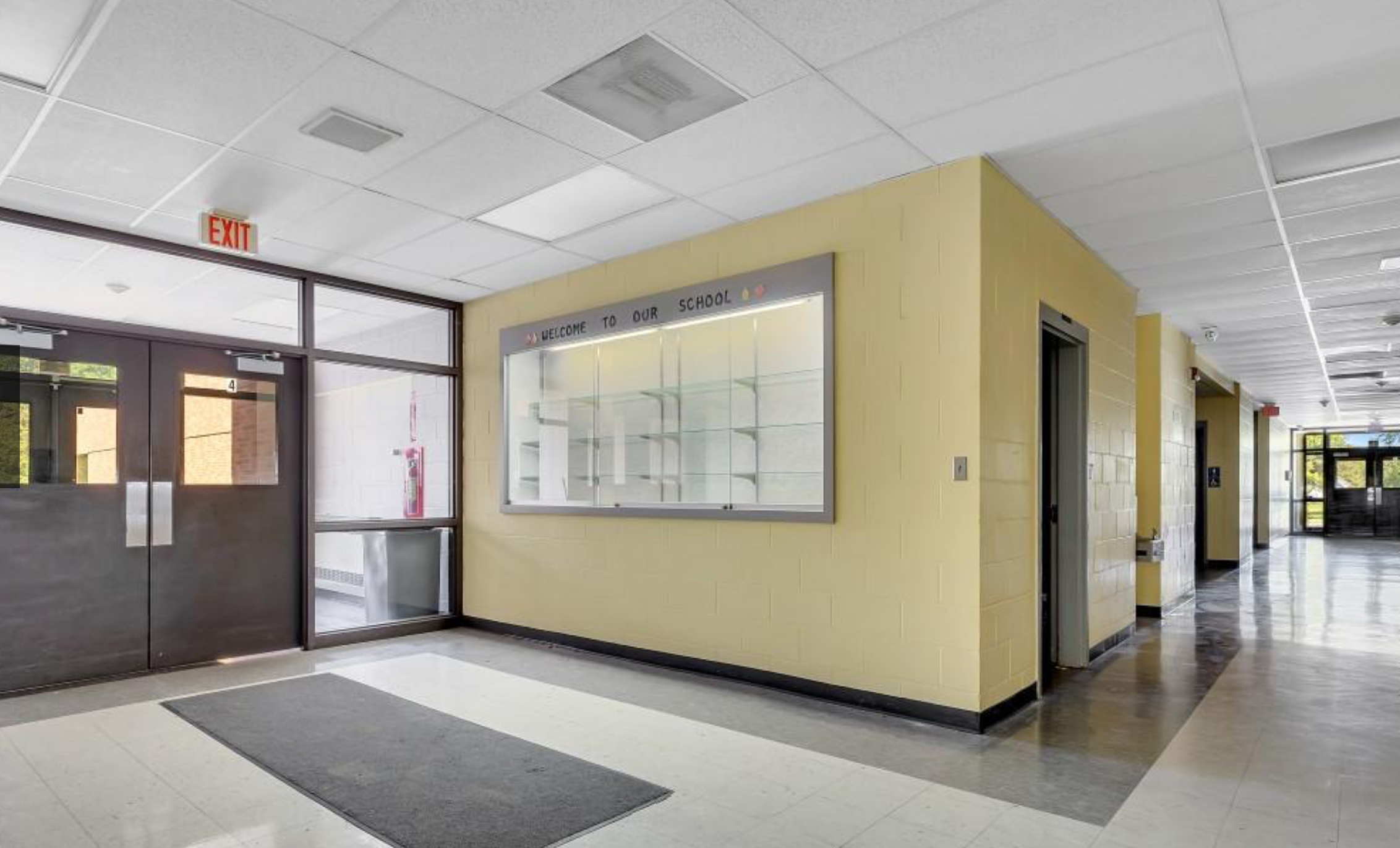 Main lobby with trophy case and glass doors